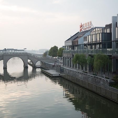 Suzhou Aomu Hotel Exterior foto